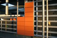 Brick facade backed with thermal insulation